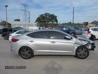 2018 Hyundai Elantra SEL z VIN 5NPD84LF2JH249227, wystawiony jako IAAI lot #38150183 z przebiegiem 116 405 mil mil oraz . Historia ofert i sprzedaży dostępna na DreamBid. Obrazek 14.