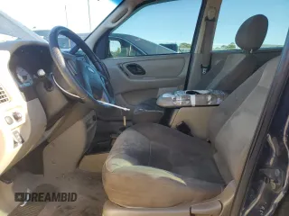2004 Ford Escape XLS with VIN 1FMYU02184DA07091, listed as a Copart auction lot 84685754 with 212,257 mi miles and Salvage Title. Bid and sale history available at DreamBid. Image 7.