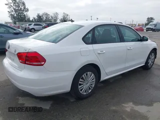 2014 Volkswagen Passat S with VIN 1VWAS7A34EC120855, listed as a IAAI auction lot 42134586 with 61,825 mi miles and . Bid and sale history available at DreamBid. Image 4.