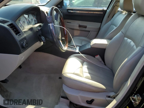 2005 Chrysler 300 C with VIN 2C3AA63H15H525775, listed as a Copart auction lot 52018135 with 59,098 mi miles and Salvage Title. Bid and sale history available at DreamBid. Image 7.