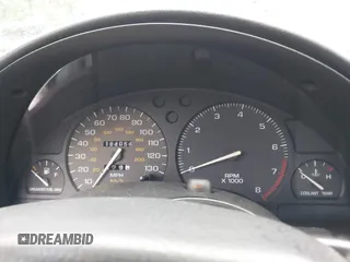 1997 Saturn SC z VIN 1G8ZG1277VZ342397, wystawiony jako IAAI lot #41966570 z przebiegiem 184 054 mil mil oraz . Historia ofert i sprzedaży dostępna na DreamBid. Obrazek 7.