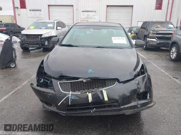 2014 Chevrolet Cruze LS z VIN 1G1PA5SHXE7351632, wystawiony jako IAAI lot #41795779 z przebiegiem 144 948 mil mil oraz . Historia ofert i sprzedaży dostępna na DreamBid. Obrazek 13.