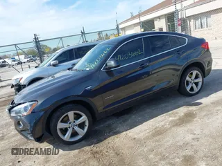 2017 BMW X4 xDrive28i with VIN 5UXXW3C36H0T79679, listed as a IAAI auction lot 42203662 with 137,863 mi miles and . Bid and sale history available at DreamBid. Image 2.