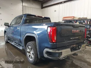 2023 GMC Sierra 1500 SLT with VIN 3GTUUDE8XPG250332, listed as a IAAI auction lot 41573099 with 45,272 mi miles and . Bid and sale history available at DreamBid. Image 3.
