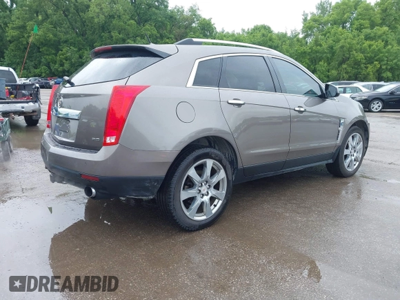 2012 Cadillac SRX Premium Collection z VIN 3GYFNCE3XCS620507, wystawiony jako IAAI lot #42348835 z przebiegiem 184 737 mil mil oraz . Historia ofert i sprzedaży dostępna na DreamBid. Obrazek 4.