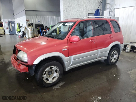 2004 Suzuki Grand Vitara LX with VIN JS3TD62V444101460, listed as a Copart auction lot 70063234 with 113,618 mi miles and Salvage Title. Bid and sale history available at carsss.com. Image 1.