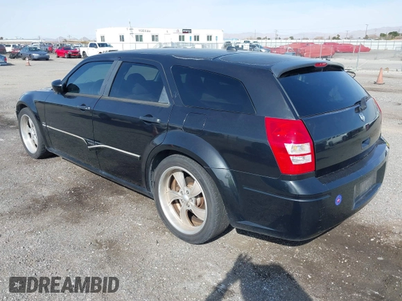 2005 Dodge Magnum RT with VIN 2D4GV58225H613701, listed as a IAAI auction lot 41848852 with 200,633 mi miles. Bid and sale history available at carsss.com. Image 3.
