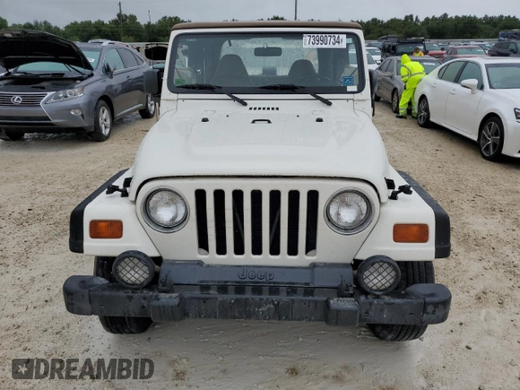 1999 Jeep Wrangler Sport with VIN 1J4FY19S2XP448670, listed as a Copart auction lot 73990734 with 0 mi miles and Non Repairable. Bid and sale history available at carsss.com. Image 5.