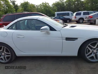 2015 Mercedes-Benz SLK 250 z VIN WDDPK4HA2FF100514, wystawiony jako IAAI lot #42414167 z przebiegiem 120 615 mil mil oraz . Historia ofert i sprzedaży dostępna na DreamBid. Obrazek 13.