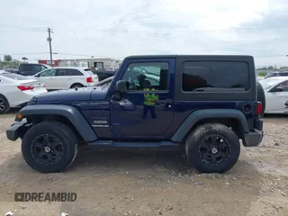 2013 Jeep Wrangler Sport with VIN 1C4AJWAG2DL505655, listed as a IAAI auction lot 42557213 with 185,502 mi miles and . Bid and sale history available at DreamBid. Image 14.