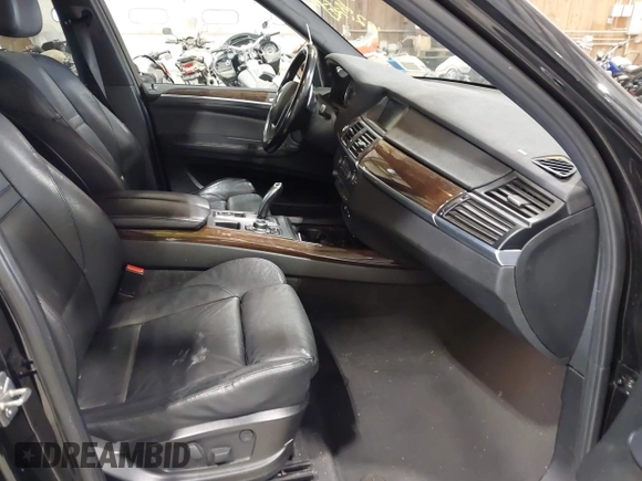 2012 BMW X5 50i with VIN 5UXZV8C50CL425721, listed as a IAAI auction lot 42590676 with 192,355 mi miles and . Bid and sale history available at DreamBid. Image 5.