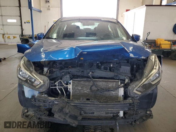 2021 Nissan Versa SV with VIN 3N1CN8EV4ML834866, listed as a Copart auction lot 62489485 with 74,300 mi miles and Salvage title. Bid and sale history available at DreamBid. Image 5.