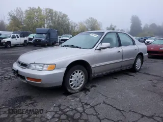 1996 Honda Accord EX with VIN 1HGCD5667TA197002, listed as a Copart auction lot 76937404 with 267,287 mi miles and Clean Title. Bid and sale history available at carsss.com. Image 1.