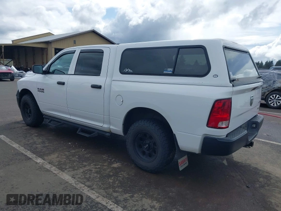 2014 Ram 1500 Tradesman with VIN 1C6RR7KG4ES323888, listed as a IAAI auction lot 41975474 with 93,779 mi miles and . Bid and sale history available at DreamBid. Image 3.