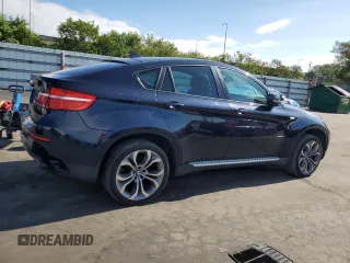 2013 BMW X6 xDrive35i z VIN 5UXFG2C50DL785065, wystawiony jako Copart lot #57036985 z przebiegiem 135 515 mil mil oraz Tytuł czysty. Historia ofert i sprzedaży dostępna na DreamBid. Obrazek 3.