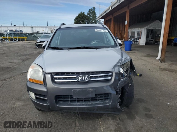 2005 Kia Sportage LX with VIN KNDJE723457117231, listed as a Copart auction lot 50163165 with 97,273 mi miles and Salvage Title. Bid and sale history available at carsss.com. Image 5.