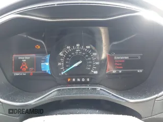 2016 Ford Fusion Titanium with VIN 3FA6P0K90GR188049, listed as a IAAI auction lot 42575477 with 239,414 mi miles and . Bid and sale history available at DreamBid. Image 7.