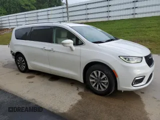 2021 Chrysler Pacifica Hybrid Touring L with VIN 2C4RC1L75MR586154, listed as a Copart auction lot 56336115 with 79,450 mi miles and Clean title. Bid and sale history available at DreamBid. Image 1.