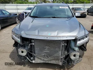 2020 GMC Acadia SLE z VIN 1GKKNRLS0LZ165157, wystawiony jako Copart lot #56304885 z przebiegiem 39 233 mil mil oraz Szkody całkowita. Historia ofert i sprzedaży dostępna na DreamBid. Obrazek 5.