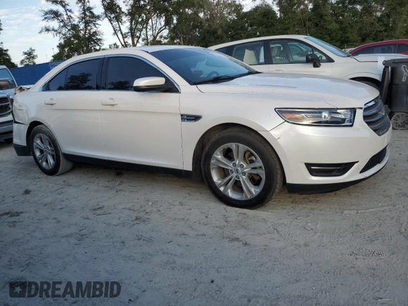 2019 Ford Taurus SEL with VIN 1FAHP2E82KG114879, listed as a Copart auction lot 80266574 with 75,561 mi miles and Salvage Title. Bid and sale history available at DreamBid. Image 4.