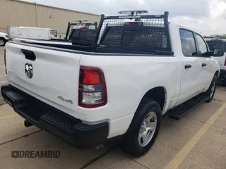 2023 Ram 1500 Tradesman with VIN 1C6RRFGG6PN620486, listed as a IAAI auction lot 42796131 with 146 mi miles and . Bid and sale history available at DreamBid. Image 1.