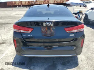 2018 Kia Optima Premium z VIN KNAGT4LE8J5023841, wystawiony jako Copart lot #61431235 z przebiegiem 193 841 mil mil oraz Czysty tytuł • Clean title. Historia ofert i sprzedaży dostępna na DreamBid. Obrazek 6.