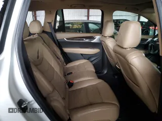 2021 Cadillac XT6 AWD Sport z VIN 1GYKPHRSXMZ195978, wystawiony jako Copart lot #80886314 z przebiegiem Nie podano mil oraz Szkoda całkowita • Salvage title. Historia ofert i sprzedaży dostępna na DreamBid. Obrazek 11.