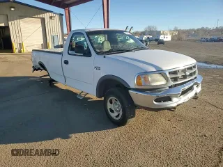1997 Ford F-150 z VIN 1FTDF18W4VKD41606, wystawiony jako Copart lot #83808524 z przebiegiem 173 675 mil mil oraz Czysty tytuł • Clean title. Historia ofert i sprzedaży dostępna na DreamBid. Obrazek 11.