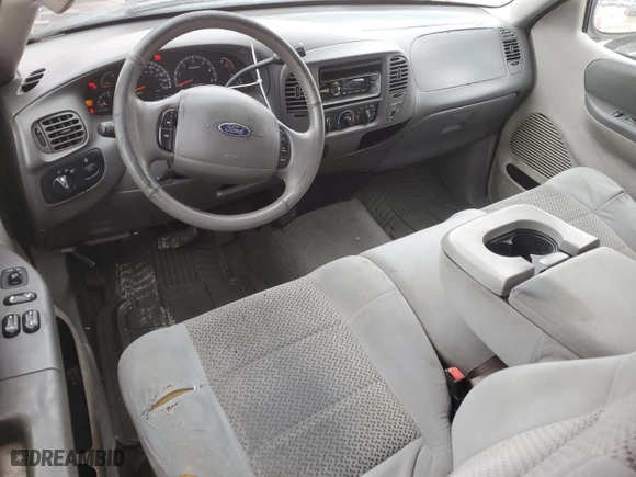 2003 Ford F-150 XL with VIN 1FTRX07W43KD70938, listed as a Copart auction lot 85127034 with 0 mi miles and Salvage Title. Bid and sale history available at carsss.com. Image 8.