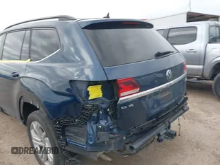 2021 Volkswagen Atlas SE z VIN 1V2JR2CA3MC555490, wystawiony jako IAAI lot #41286240 z przebiegiem 89 435 mil mil oraz . Historia ofert i sprzedaży dostępna na DreamBid. Obrazek 18.