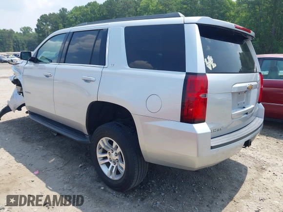 2019 Chevrolet Tahoe LT with VIN 1GNSKBKC8KR363433, listed as a IAAI auction lot 42567045 with 122,956 mi miles and . Bid and sale history available at DreamBid. Image 3.