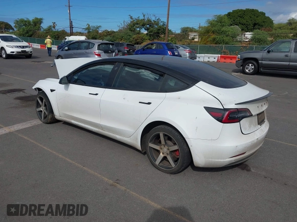 2019 Tesla Model 3 Mid Range with VIN 5YJ3E1EA6KF396946, listed as a IAAI auction lot 41123058 with 69,013 mi miles and . Bid and sale history available at carsss.com. Image 3.