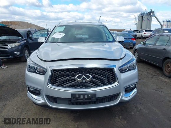 2019 Infiniti QX60 Luxe with VIN 5N1DL0MMXKC554603, listed as a IAAI auction lot 41751072 with 49,654 mi miles and . Bid and sale history available at DreamBid. Image 12.