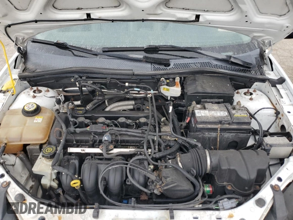 2007 Ford Focus S z VIN 1FAHP34N57W223198, wystawiony jako Copart lot #55725345 z przebiegiem 174 833 mil mil oraz Szkoda całkowita • Salvage title. Historia ofert i sprzedaży dostępna na DreamBid. Obrazek 11.