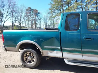 1997 Ford F-150 XL with VIN 1FTDX1860VNA37152, listed as a IAAI auction lot 41713372 with 200,777 mi miles. Bid and sale history available at carsss.com. Image 12.