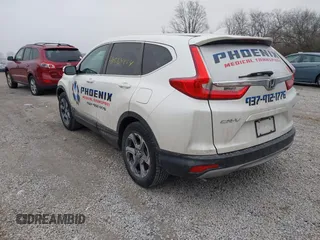 2017 Honda CR-V EX with VIN 2HKRW2H56HH682396, listed as a IAAI auction lot 41569854 with 74,392 mi miles. Bid and sale history available at carsss.com. Image 3.