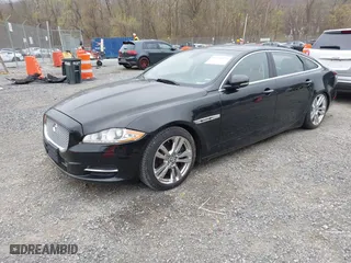 2012 Jaguar XJ with VIN SAJWA2GBXCLV32998, listed as a IAAI auction lot 41954979 with 1 mi miles. Bid and sale history available at carsss.com. Image 2.