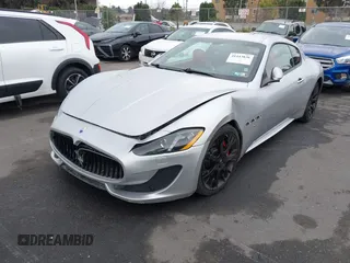 2013 Maserati GranTurismo Sport with VIN ZAM45VLA1D0072153, listed as a IAAI auction lot 41443836 with 44,991 mi miles. Bid and sale history available at carsss.com. Image 2.