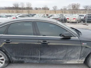 2013 Audi A6 3.0T Prestige with VIN WAUHGAFC3DN061788, listed as a IAAI auction lot 41129245 with 137,575 mi miles. Bid and sale history available at carsss.com. Image 13.