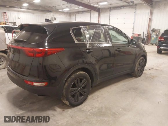 2018 Kia Sportage LX with VIN KNDPM3AC6J7417371, listed as a IAAI auction lot 41879390 with 112,944 mi miles and . Bid and sale history available at carsss.com. Image 4.