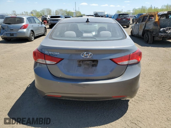 2013 Hyundai Elantra GLS z VIN 5NPDH4AE0DH194355, wystawiony jako Copart lot #57059235 z przebiegiem 199 999 mil mil oraz Szkoda całkowita • Salvage title. Historia ofert i sprzedaży dostępna na DreamBid. Obrazek 6.