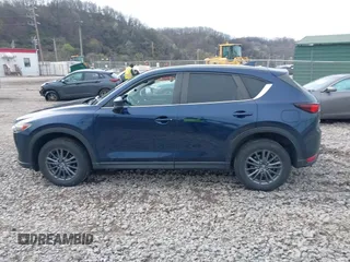 2019 Mazda CX-5 Touring with VIN JM3KFBCM5K0689948, listed as a IAAI auction lot 41976266 with 74,812 mi miles. Bid and sale history available at carsss.com. Image 14.