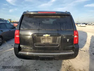 2015 Chevrolet Suburban LTZ with VIN 1GNSCKKC7FR542713, listed as a Copart auction lot 87277044 with 224,872 mi miles and Clean Title. Bid and sale history available at carsss.com. Image 6.