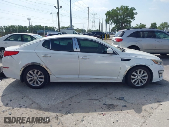 2015 Kia Optima EX with VIN 5XXGN4A72FG414486, listed as a IAAI auction lot 41870529 with 119,029 mi miles. Bid and sale history available at carsss.com. Image 13.