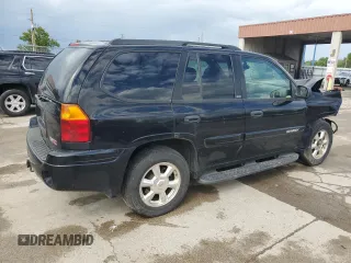 2003 GMC Envoy SLE z VIN 1GKDT13S432160651, wystawiony jako Copart lot #56938205 z przebiegiem 197 593 mil mil oraz Szkoda całkowita • Salvage title. Historia ofert i sprzedaży dostępna na DreamBid. Obrazek 3.