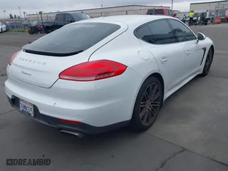 2015 Porsche Panamera 4 with VIN WP0AA2A71FL000458, listed as a IAAI auction lot 41862221 with 66,946 mi miles. Bid and sale history available at carsss.com. Image 4.