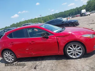 2017 Mazda 3 Touring with VIN 3MZBN1L73HM118171, listed as a IAAI auction lot 42673706 with 105,496 mi miles and . Bid and sale history available at DreamBid. Image 13.