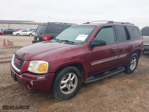 2003 GMC Envoy SLT with VIN 1GKDS13S532314397, listed as a IAAI auction lot 41184274 with 232,750 mi miles. Bid and sale history available at carsss.com. Image 2.