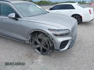 2023 Genesis GV70 Sport with VIN KMUMCDTC1PU098851, listed as a IAAI auction lot 41864774 with 15,016 mi miles and . Bid and sale history available at DreamBid. Image 6.