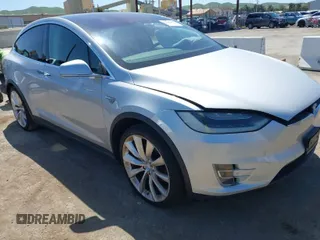 2016 Tesla Model X P90D with VIN 5YJXCAE49GF001067, listed as a IAAI auction lot 41980455 with 94,746 mi miles. Bid and sale history available at carsss.com. Image 1.